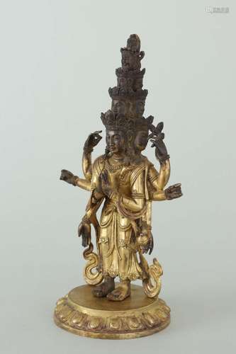 A GILT-BRONZE FIGURE OF GUANYIN