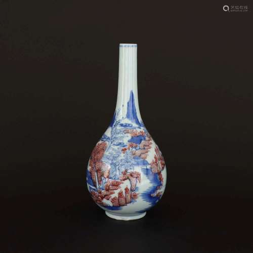 AN IRON-RED BLUE AND WHITE VASE