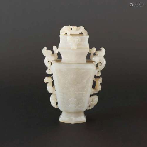 A CARVED JADE 'DRAGON' VASE AND COVER