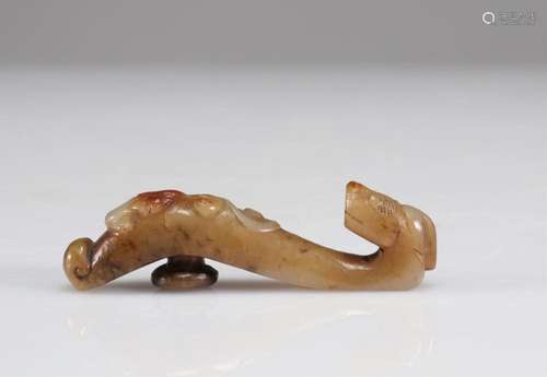 JADE FIBULA CARVED WITH A DRAGON'S HEAD AND A QING DYNAS...