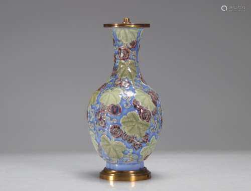 PORCELAIN VASE IN RELIEF WITH PLANTS AND BUTTERFLIES, QING P...