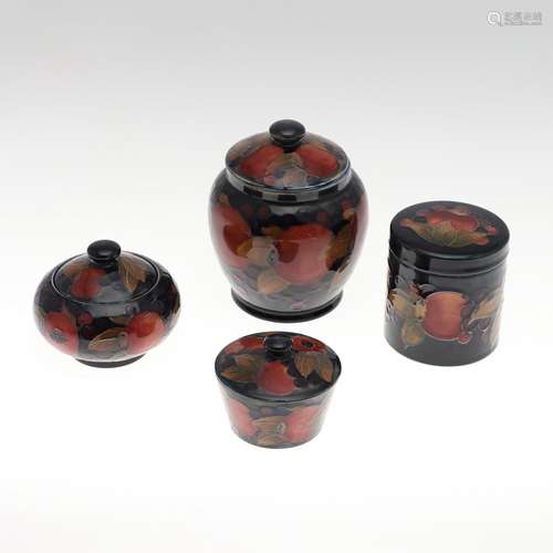 MOORCROFT LIDDED JAR, & THREE OTHER LIDDED JARS.