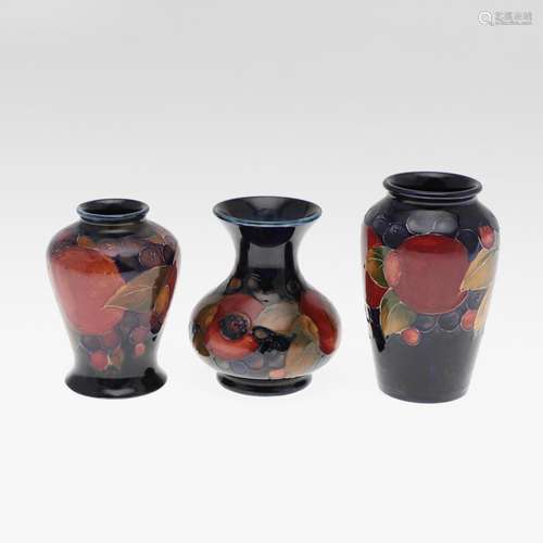 MINIATURE ANTIQUE MOORCROFT VASES.