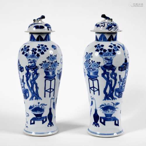 PAIR OF CHINESE 19THC BLUE & WHITE LIDDED VASES.