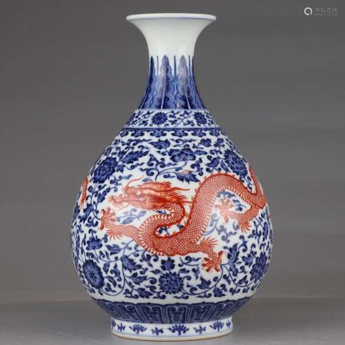 Blue and white twined lotus and alum red dragon pattern jade...