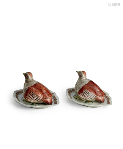A RARE PAIR OF 'ROOSTING PARTRIDGE' TUREENS, COVERS AND STAN...