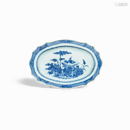 AN UNUSUAL BLUE AND WHITE SHAPED AND SCALLOPED OVAL PLATTER ...