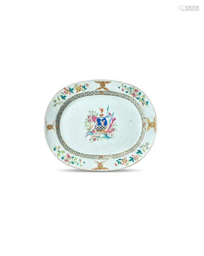 A LARGE FAMILLE ROSE ARMORIAL OVAL CHARGER Qianlong period, ...