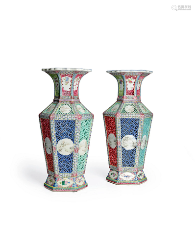 A PAIR OF FAMILLE ROSE DOUBLE-WALLED RETICULATED HEXAGONAL B...