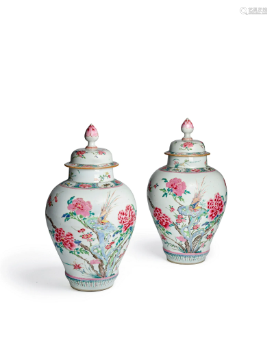 AN OUTSTANDING PAIR OF FAMILLE ROSE BALUSTER JARS AND COVERS...