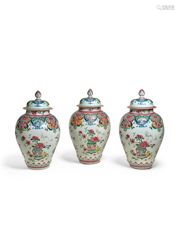 AN EXTREMELY FINE AND LARGE FAMILLE ROSE THREE-PIECE GARNITU...