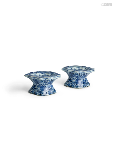 A RARE PAIR OF BLUE AND WHITE LEAF-SHAPED PEDESTAL SALTS FOR...