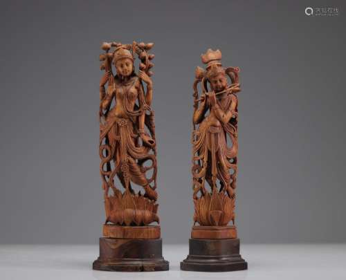 Paire de statuettes (homme & femme) en bois finement scu...