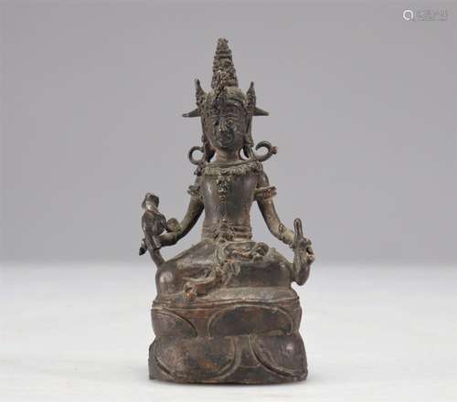 Bouddha en bronze Indonésie XVIIIème<br />
Poids: 195 g<br /...