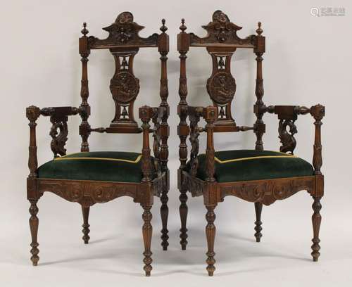 A Pair of Carved Victorian Arm Chairs.