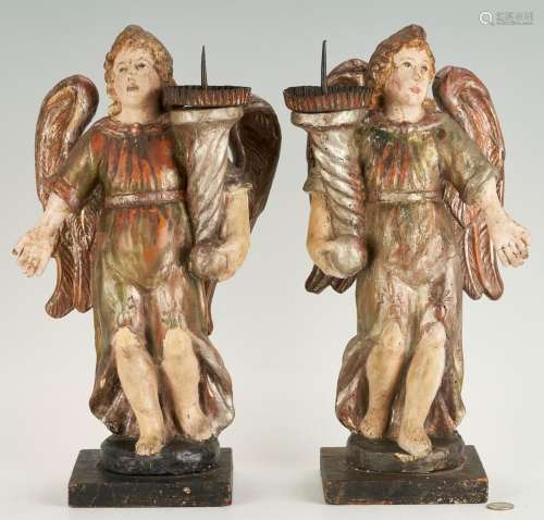 PAIR OF CONTINENTAL CARVED POLYCHROME ANGEL PRICKET TORCHERE...