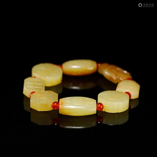 CHINESE HETIAN YELLOW JADE BEADED BRACELET WITH CARVED 'ASHT...