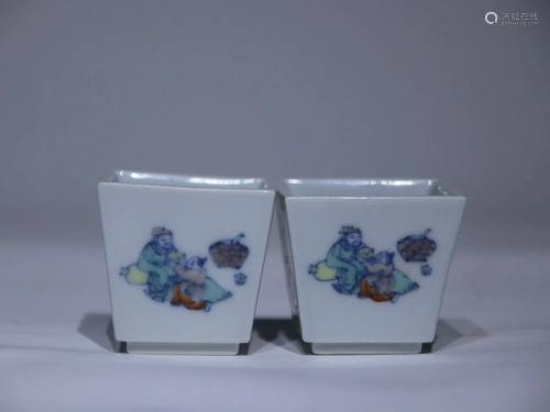 TWO CHINESE DOUCAI CUPS DEPICTING 'FIGURE STORY', 'QING KANG...