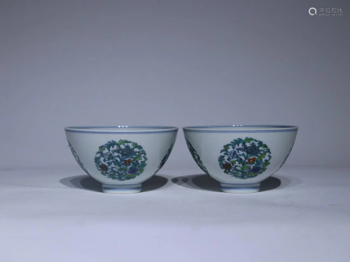 TWO CHINESE DOUCAI CUPS DEPICTING 'FLORAL', 'QING YONGZHENG'...