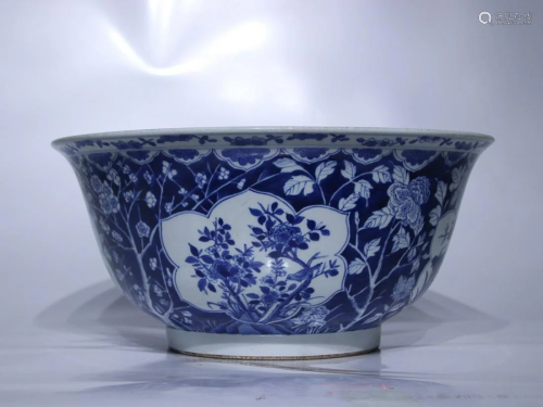 CHINESE BLUE-AND-WHITE BOWL DEPICTING 'BIRD AND FLOWER', 'QI...