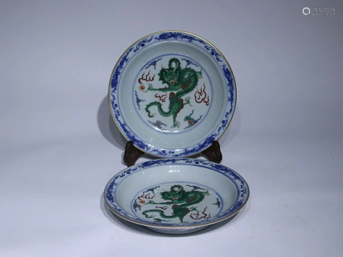 TWO CHINESE BLUE-AND-WHITE AND FAMILLE-VERTE CHARGERS DEPICT...