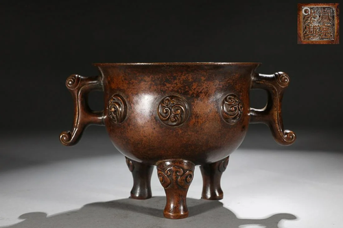 CHINESE BRONZE HANDLED CENSER ON THREE LEGS, 'XUANDE' MARK