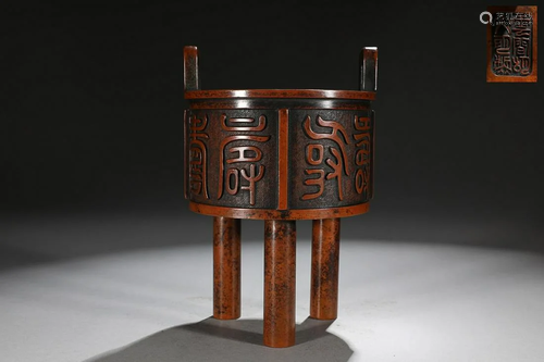 CHINESE INSCRIBED BRONZE HANDLED DING-FORM CENSER ON THREE L...