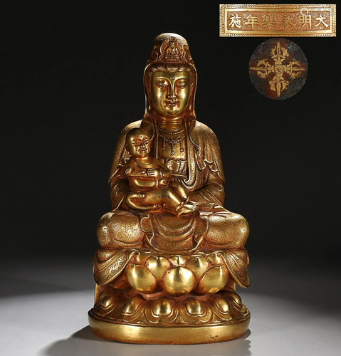 CHINESE GILT-BRONZE FIGURE OF GUANYIN, 'MING YONGLE' MARK