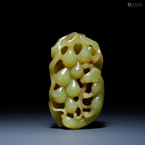 CHINESE HETIAN JADE HANDPIECE WITH CARVED 'SQUIRREL AND GRAP...