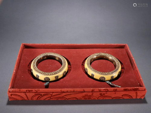 TWO CHINESE GILT-SILVER-INLAID RARE MATERIAL BANGLES DEPICTI...