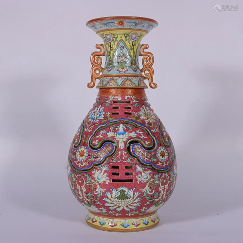 CHINESE RED-GROUND YANGCAI VASE DEPICTING 'FLORAL', 'QING QI...