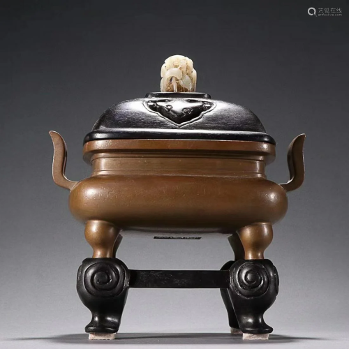 CHINESE BRONZE HANDLED CENSER ON FOUR LEGS