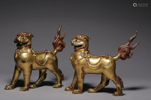 TWO CHINESE GILT-BRONZE LIONS