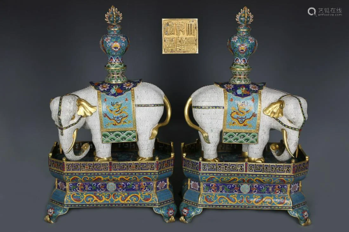 TWO CHINESE CLOISONNE ENAMEL ELEPHANTS, 'QING QIANLONG' MARK