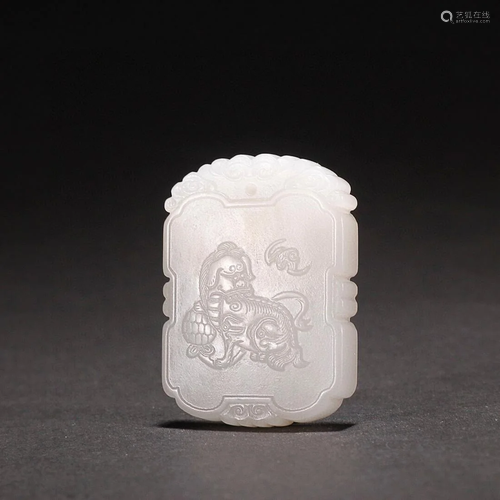 CHINESE HETIAN JADE PLAQUE WITH CARVED 'LION'