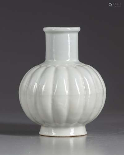 A CHINESE WHITE GLAZED LOBED VASE