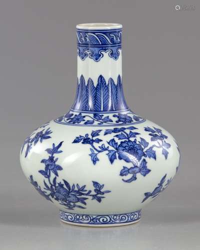 A CHINESE BLUE AND WHITE BOTTLE VASE