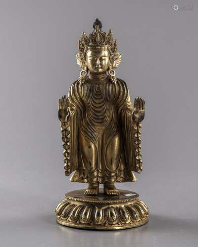 A GILT BRONZE FIGURE OF BUDDHA, 20TH CENTURY