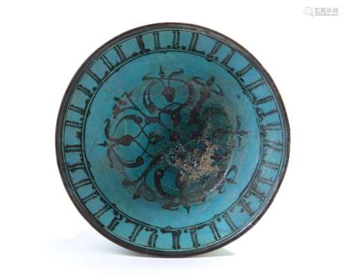 A RAQQA TURQUOISE GLAZED POTTERY BOWL, SYRIA,13TH-14TH CENTU...