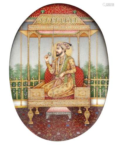 A FINE INDIAN OVAL PORTRAIT ON IVORY OF MUGHAL EMPEROR JAHAN...