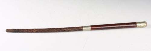 An early to mid-20th century military riding crop with nicke...