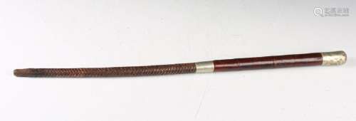 An early to mid-20th century military riding crop with nicke...