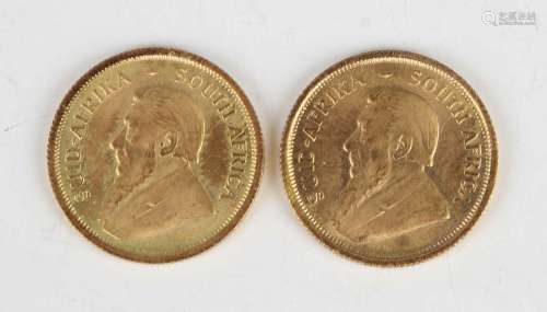Two South Africa one-tenth Krugerrands, both 1982.