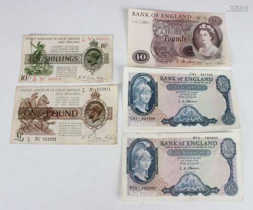 A collection of British banknotes, including a one pound not...