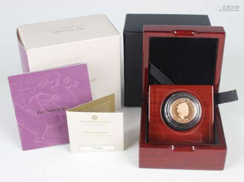 An Elizabeth II Royal Mint proof sovereign 2021, within a de...