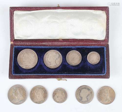 A Victoria Young Head four-coin Maundy set 1867, cased, toge...