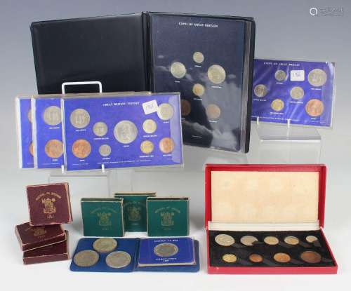 A George VI nine-coin specimen set 1950, within a red fitted