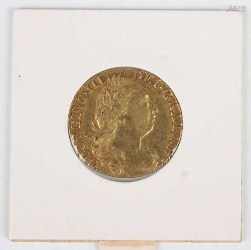 A George III guinea 1774.