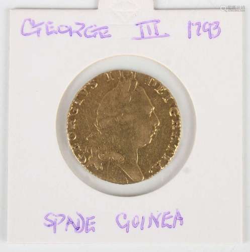 A George III guinea 1793 (previously mounted).