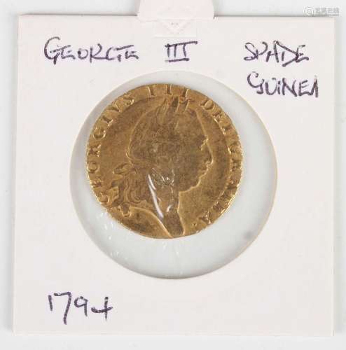 A George III guinea 1794 (previously mounted).